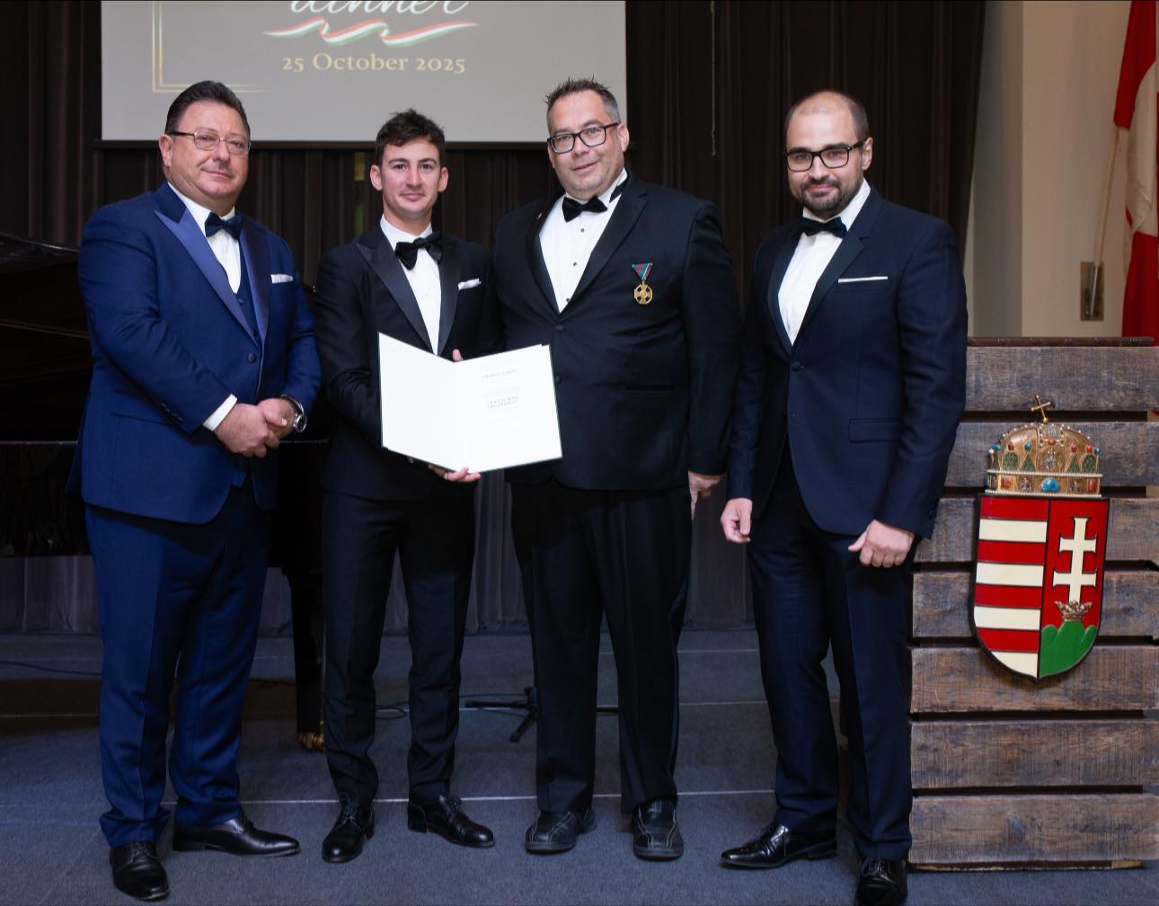 Ed Lamers receiving the Hungarian Gold Cross of Merit at the Hungarian Heritage Month gala dinner in Toronto.