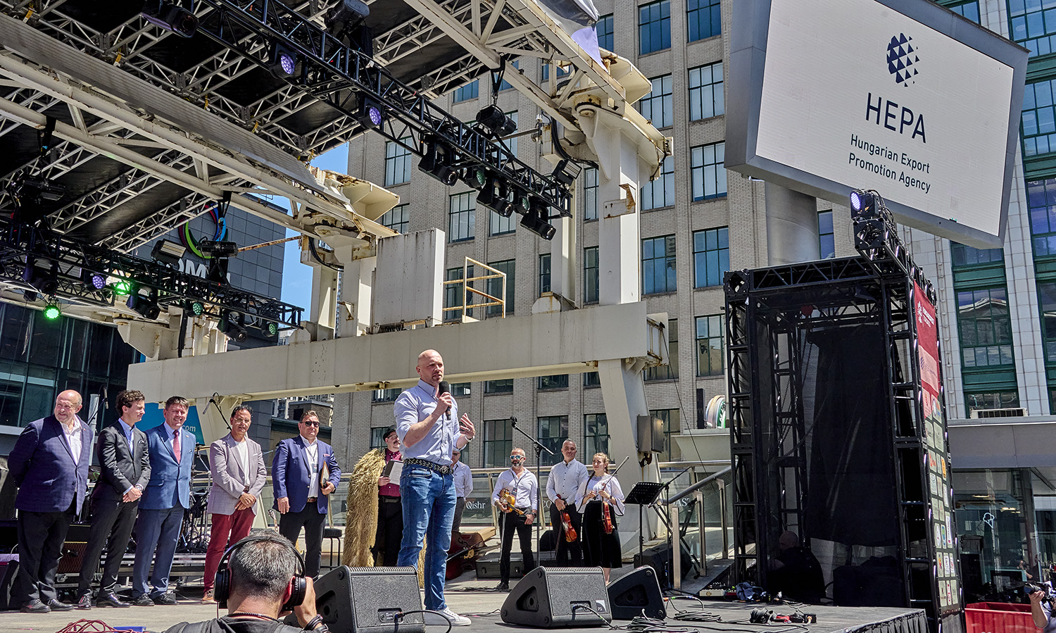 Brad Bradford addresses attendees during the opening ceremony of HungaroFest Toronto 2026 at Sankofa Square.